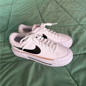 Nike Women's White and Black Sneakers with Tan Accent